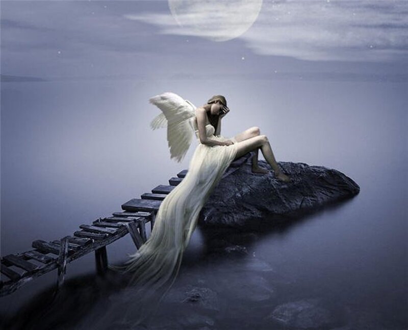 Angel Sitting on Rock
