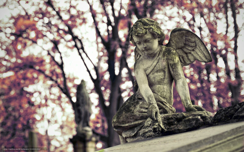 Angel statue in autumn park