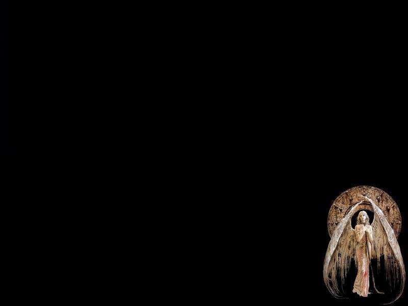 angel statue in dark background