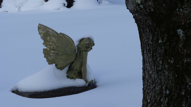 Angel Statue in Snow — White