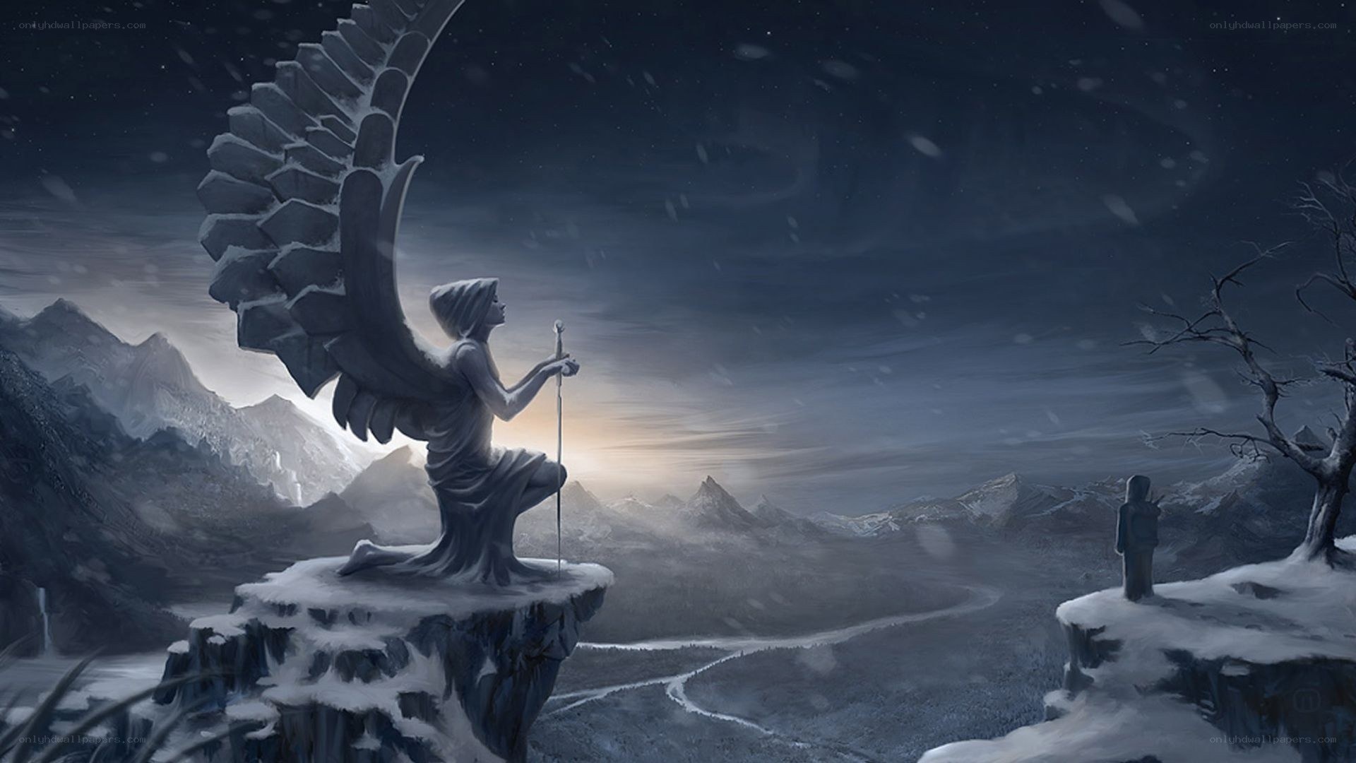 Angel statue in snowy mountains