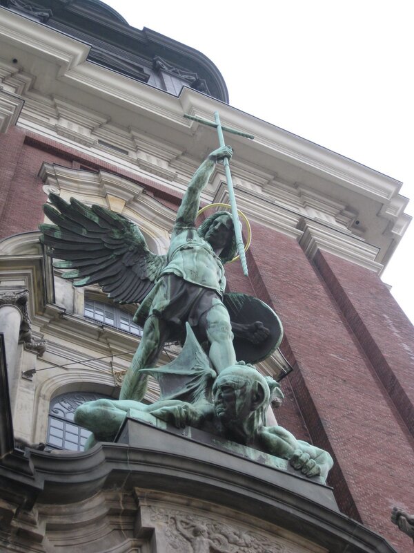 Angel statue on building facade