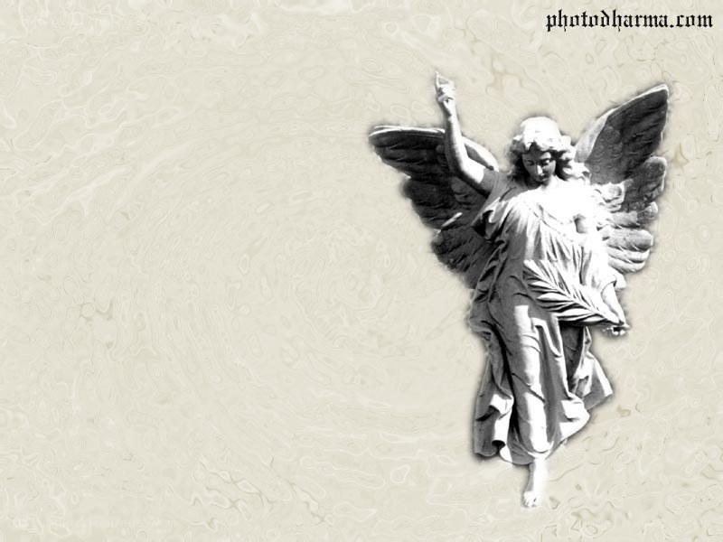 Angel statue on textured background