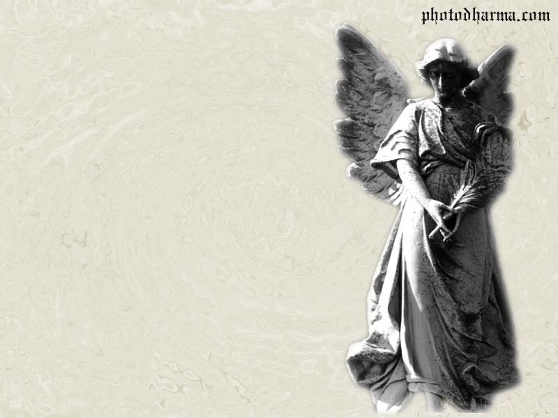 Angel statue on textured background