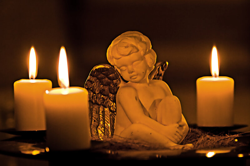 Angel Statue with Candles