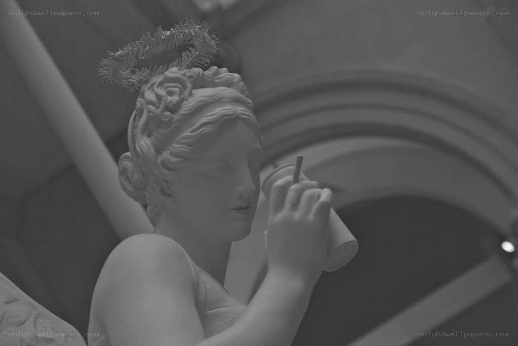 Angel statue with drink