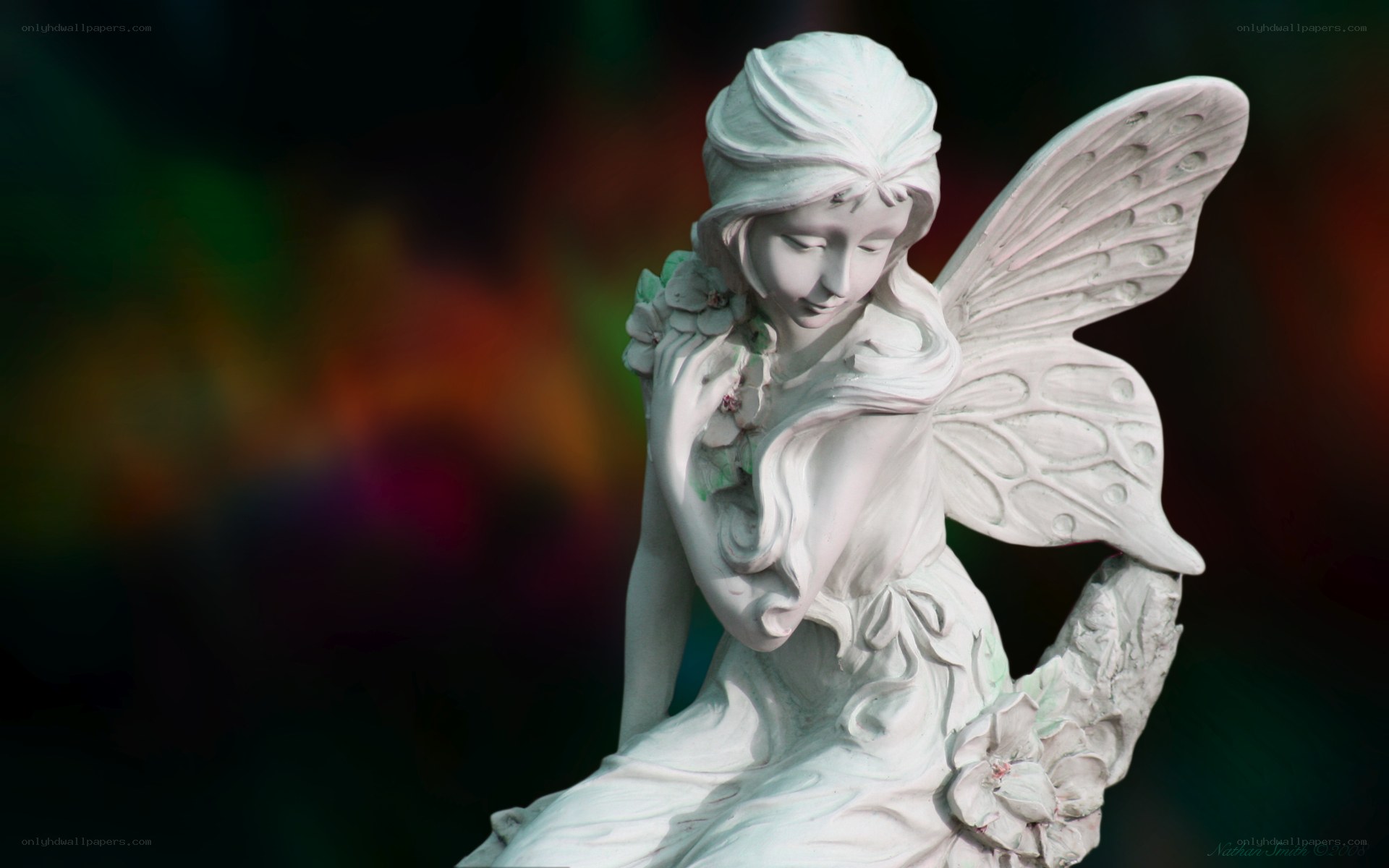 Angel statue with flowers