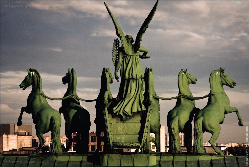 Angel statue with horses