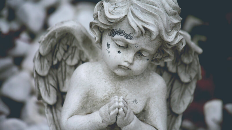 Angel Statue with Tattoos