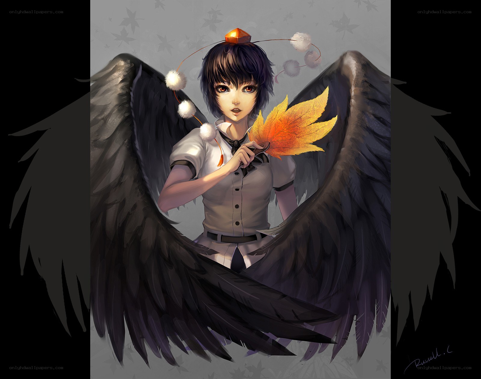 angel with black wings holding leaf
