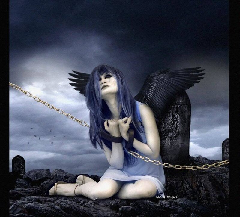 angel with black wings in graveyard