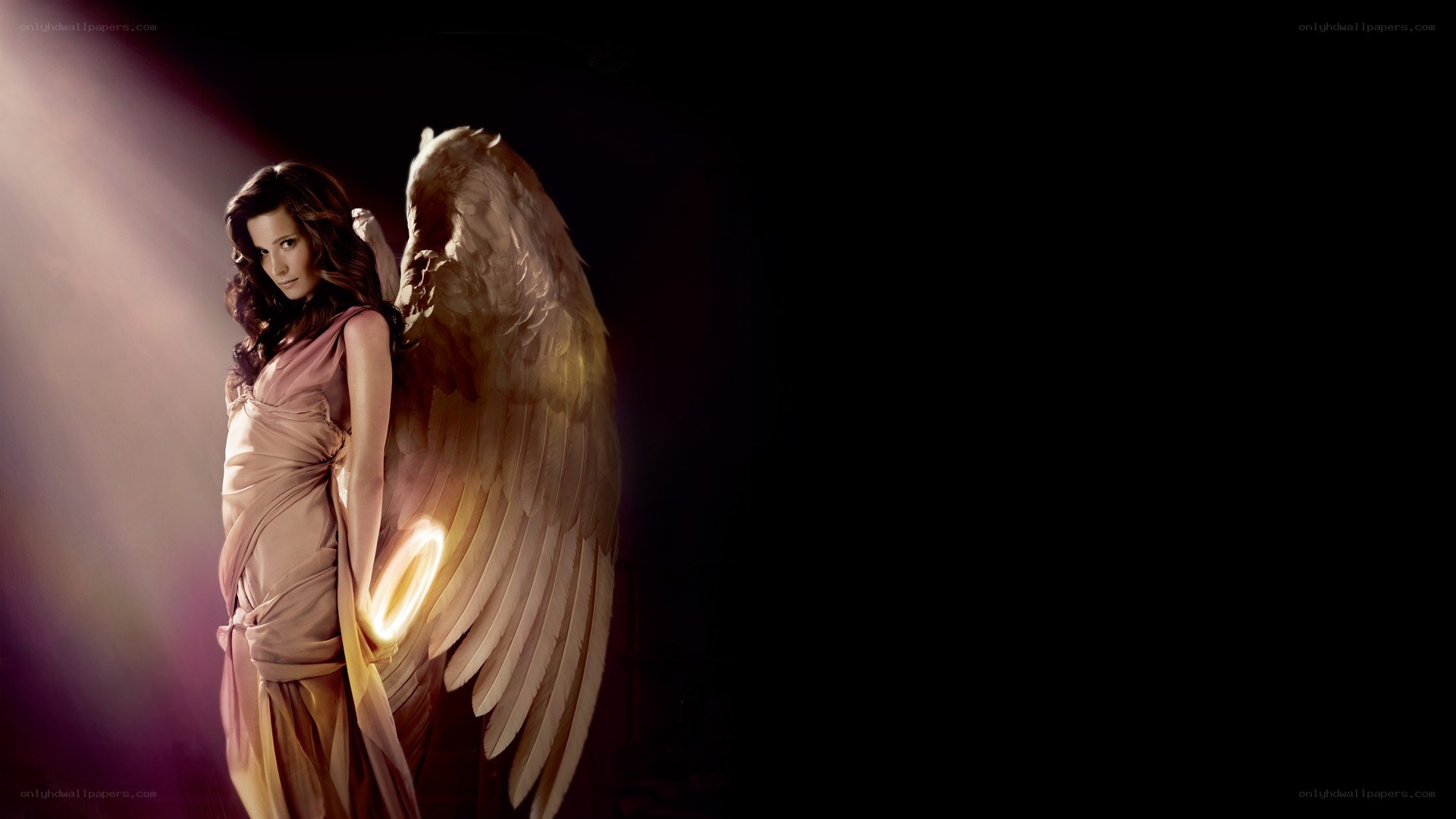 angel with glowing wings