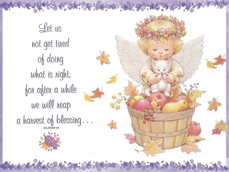 Angel with kitten and harvest basket