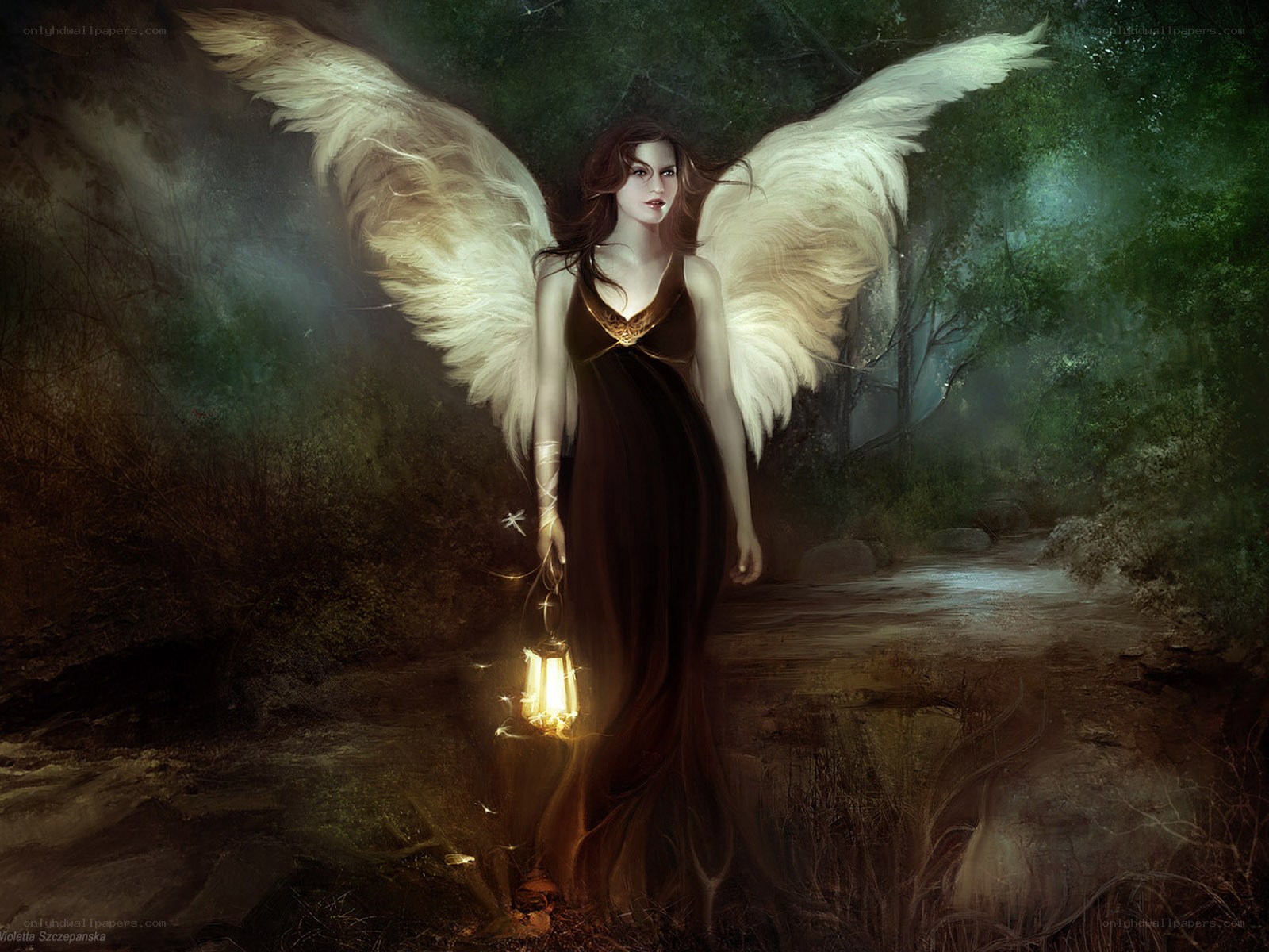 Angel with lantern in forest