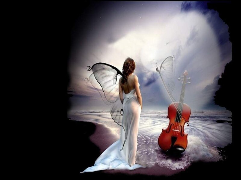 Angel with violin on beach