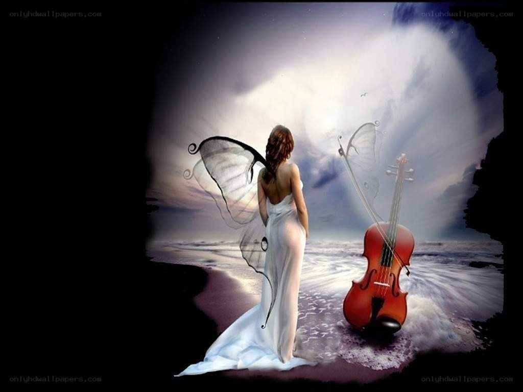 Angel with violin on beach