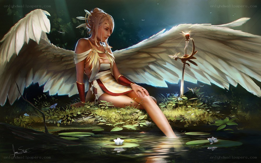 Angel with wings by a pond