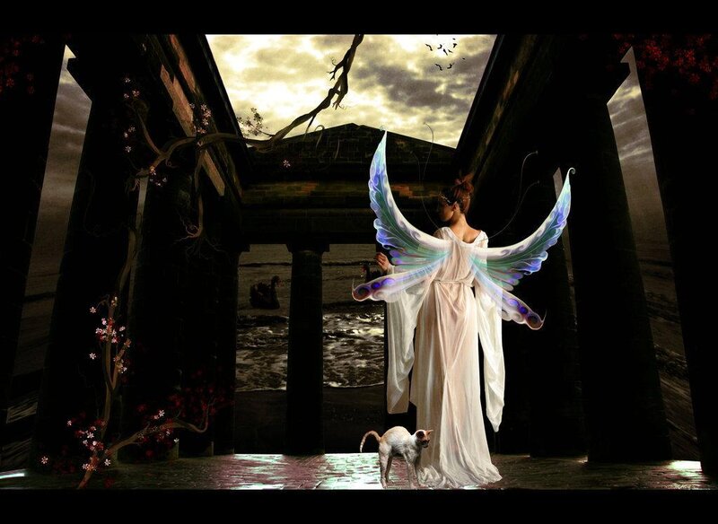 Angel with wings in ancient ruins