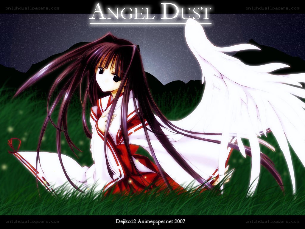 Angel with wings in grass
