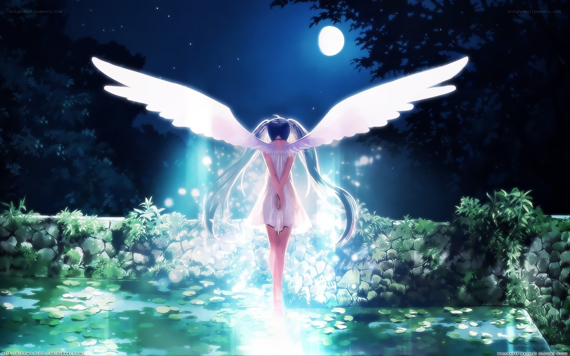 Angel with wings in moonlight