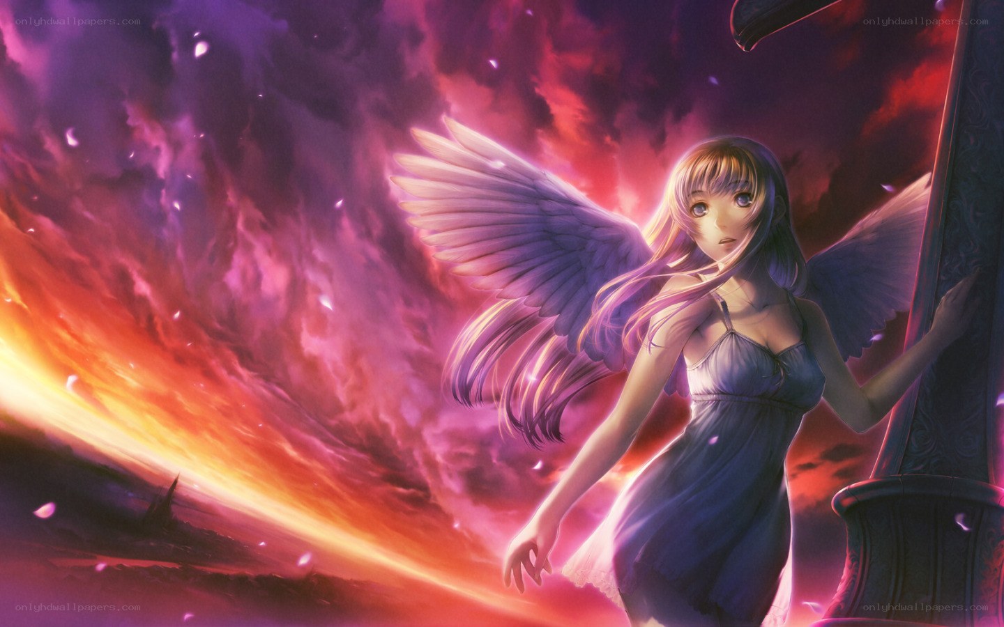 angel with wings in sunset