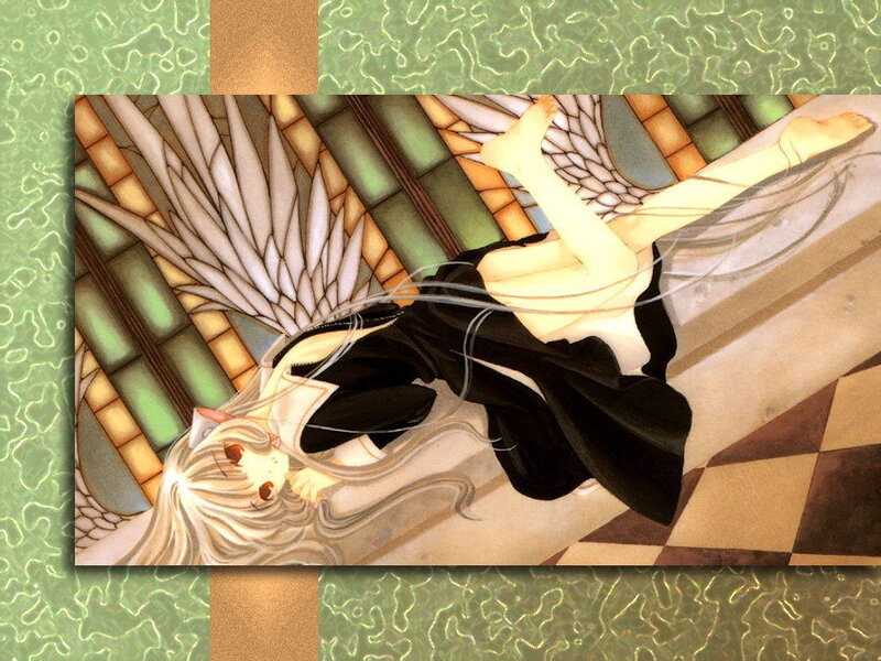 Angel with wings lying down