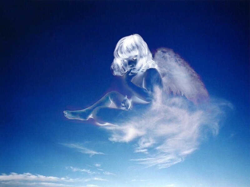 angelic figure in the sky