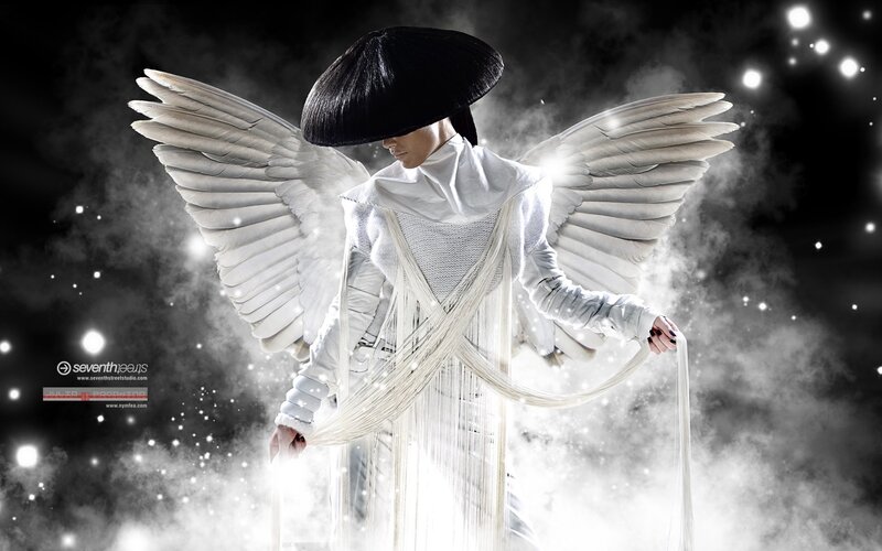 angelic figure with white wings