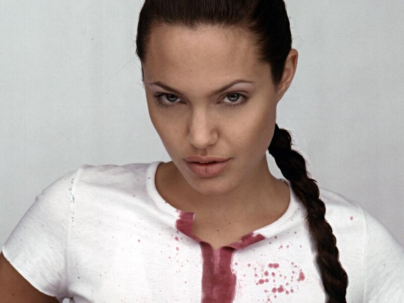 Angelina Jolie with blood-stained shirt