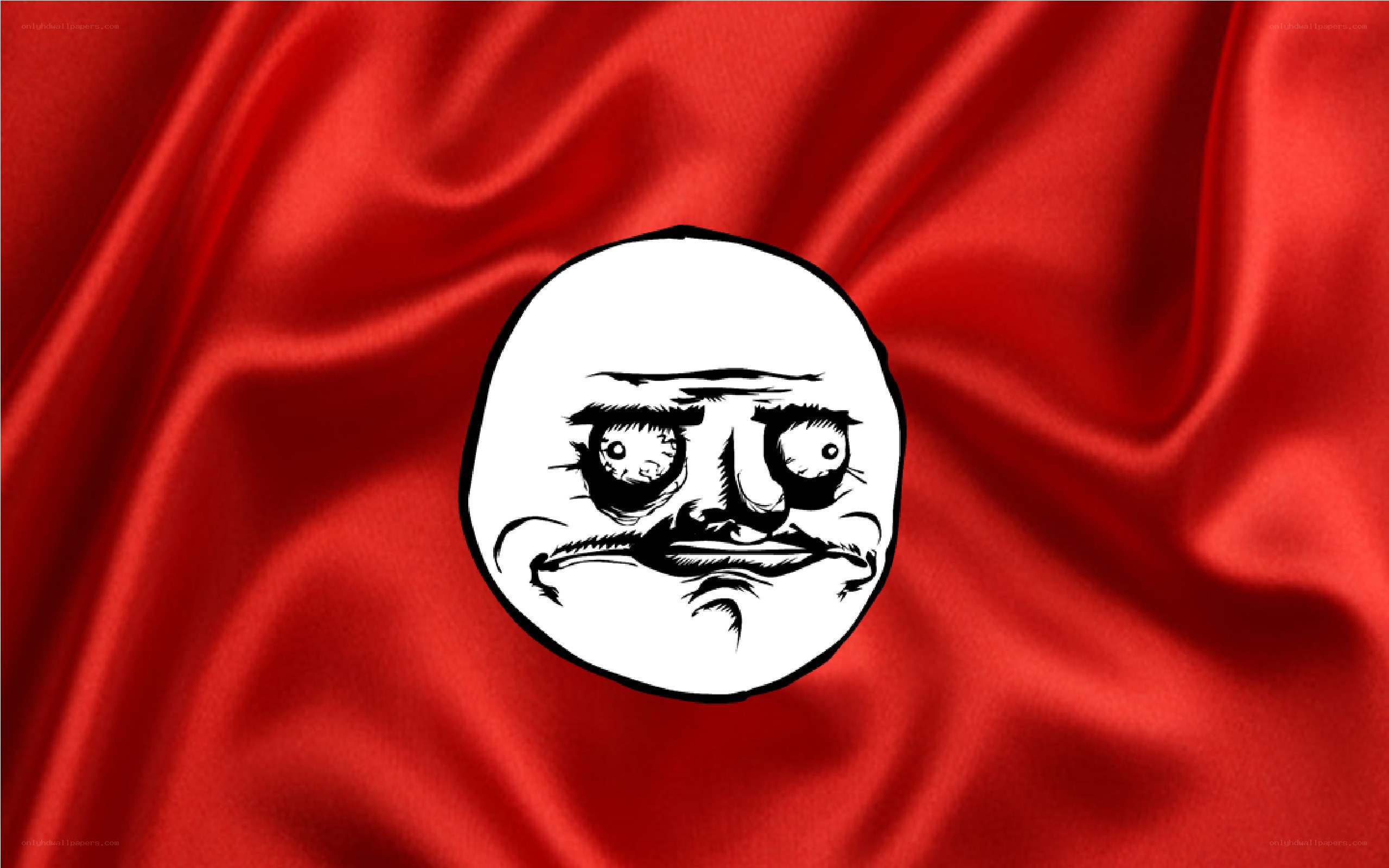 angry face meme on red fabric