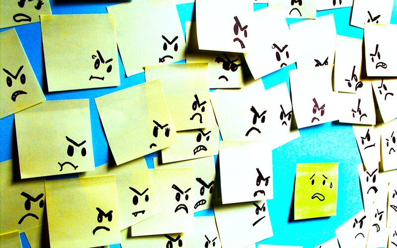 Angry Faces on Sticky Notes — Yellow