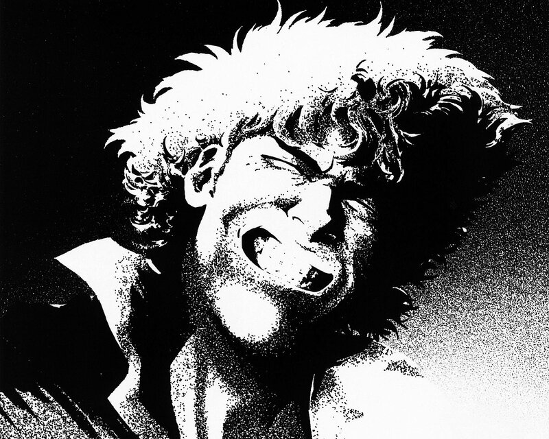 angry man with curly hair