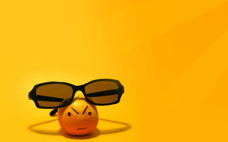 angry orange with sunglasses