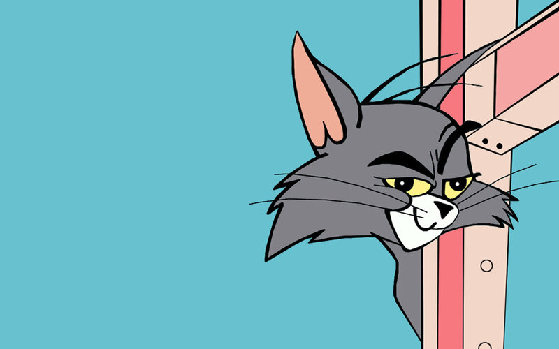 angry tom peeking from corner