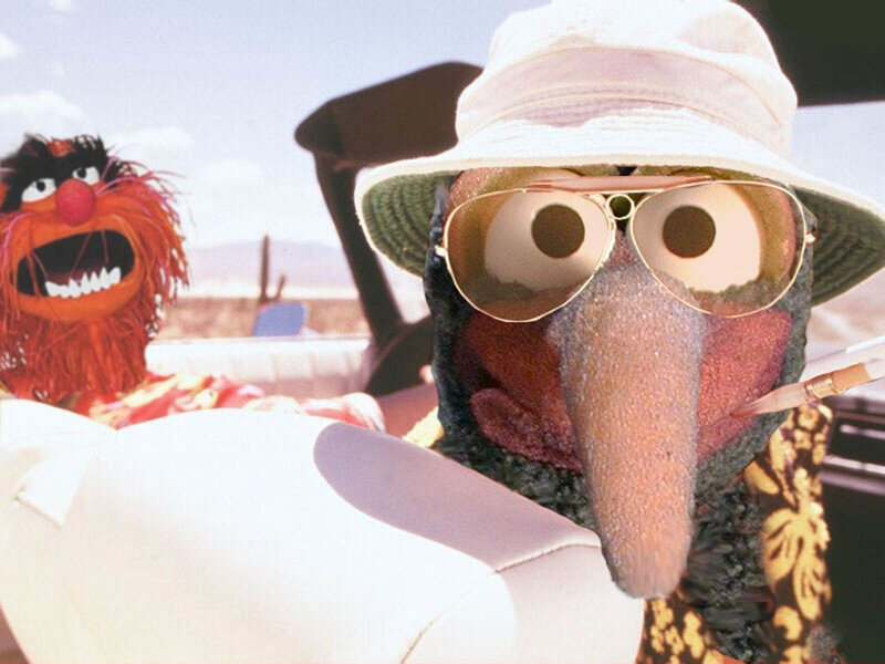 Animal and Gonzo in a car