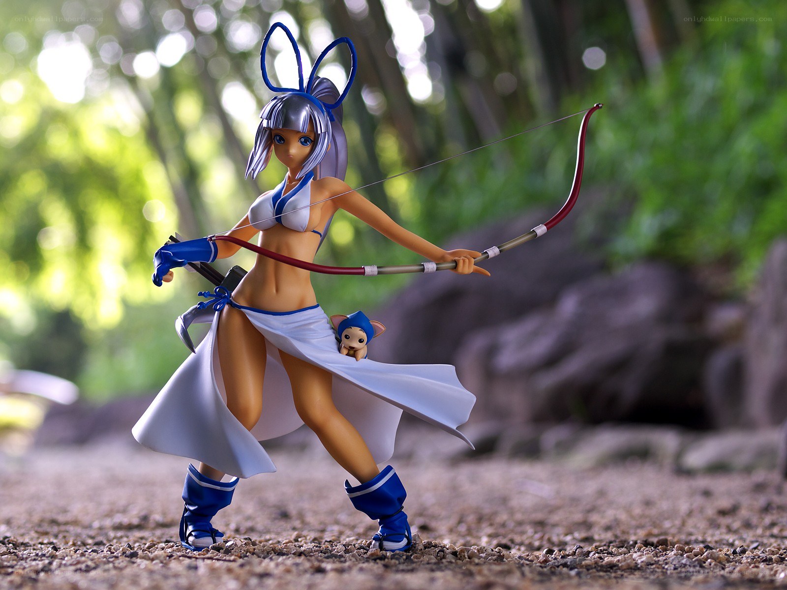 Anime archer figurine in forest