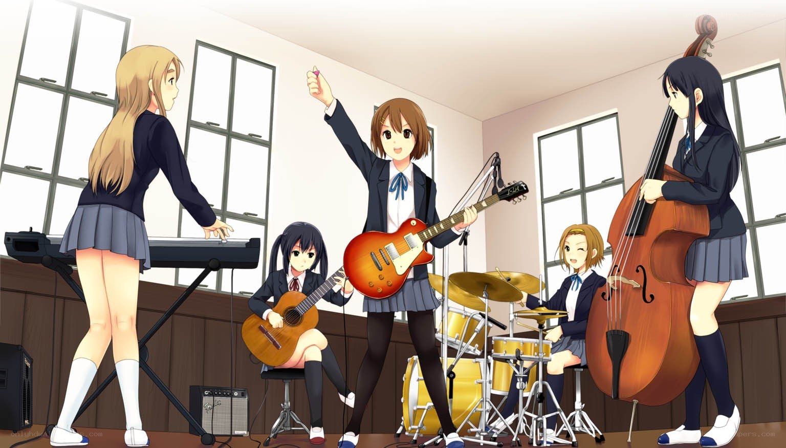 anime band performing in a room