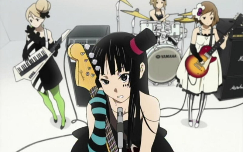 anime band performing on stage