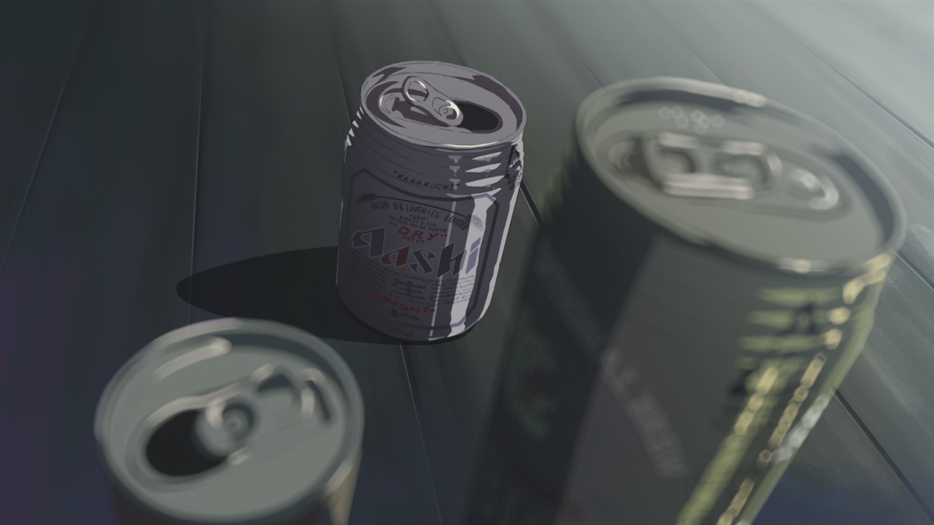 anime beer cans on table