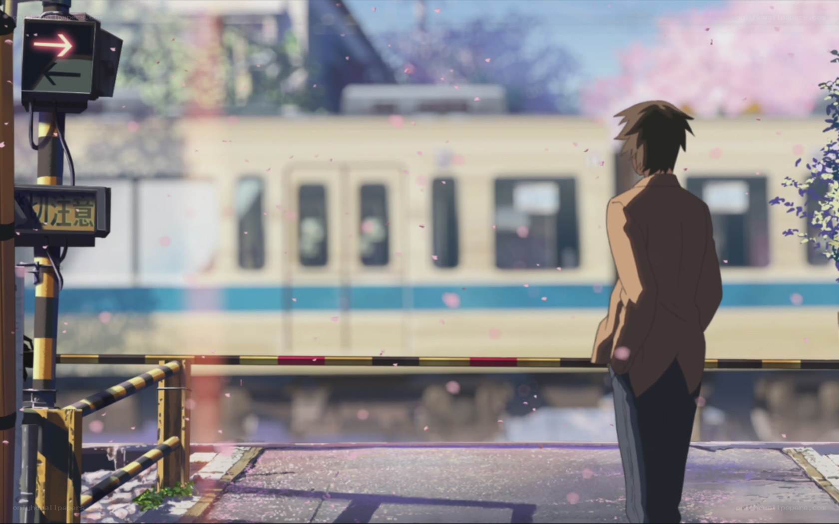 Anime boy at train crossing