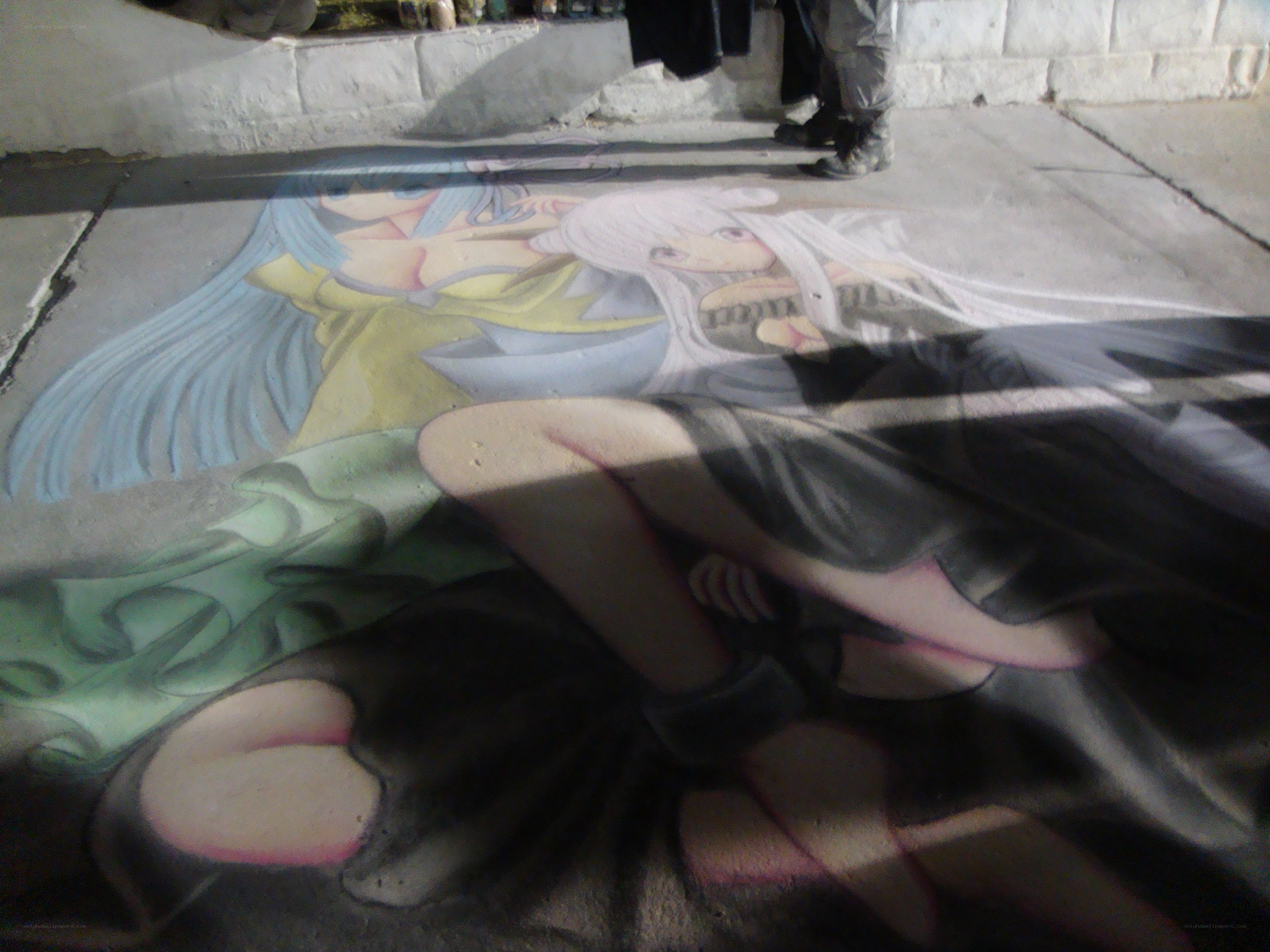 Anime chalk art on pavement