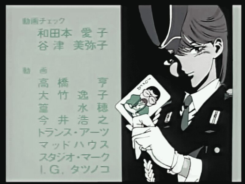 Anime character holding photo
