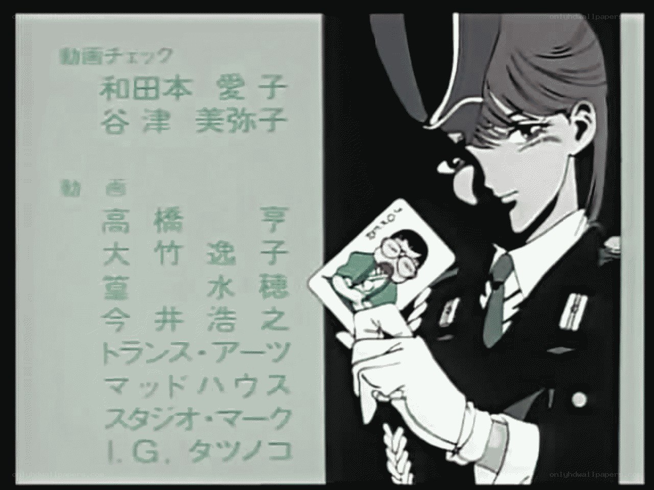 Anime character holding photo