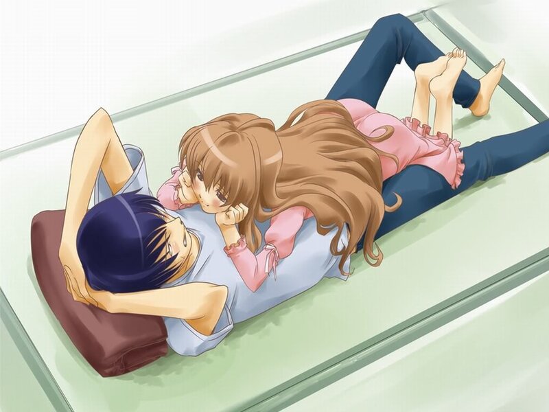 Anime couple on a bed