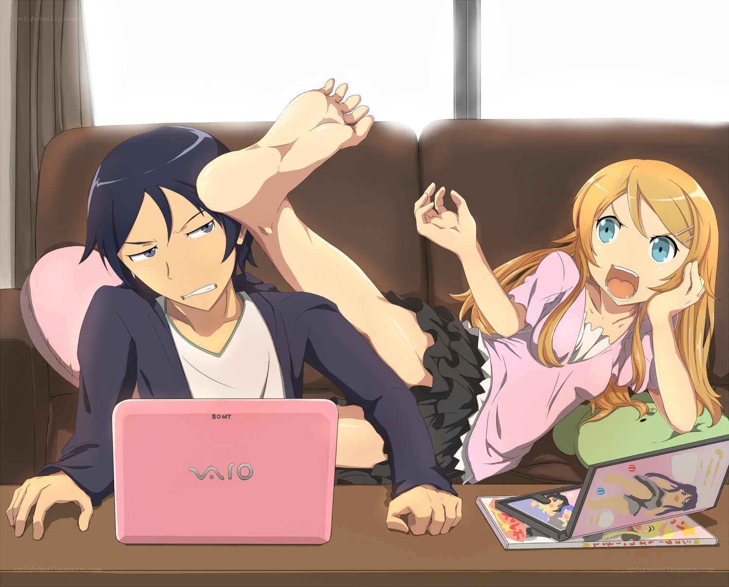 Anime couple on couch with laptops