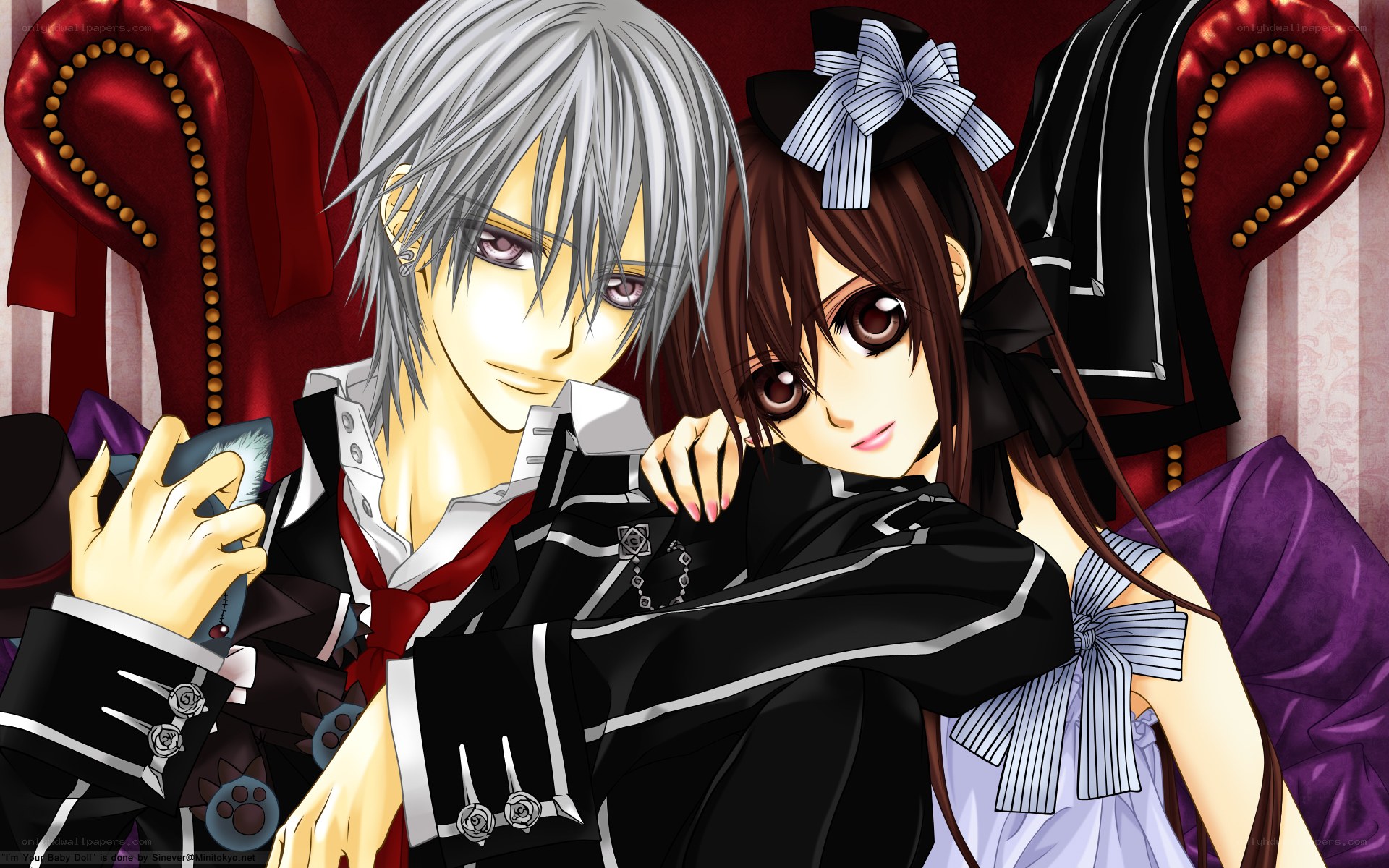 anime couple on red couch