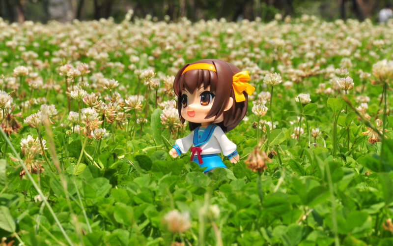Anime figure in a flower field