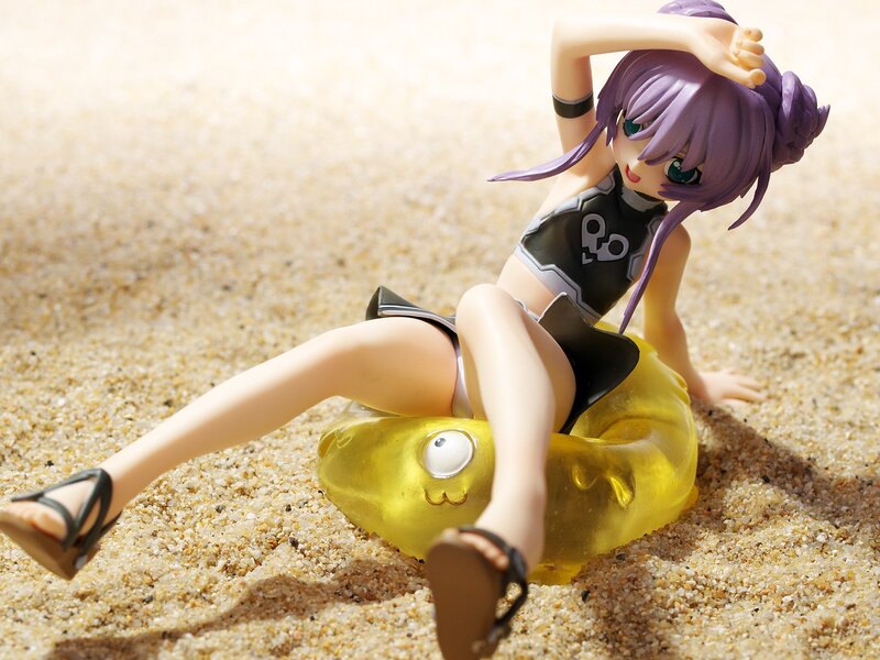 anime figure on beach float