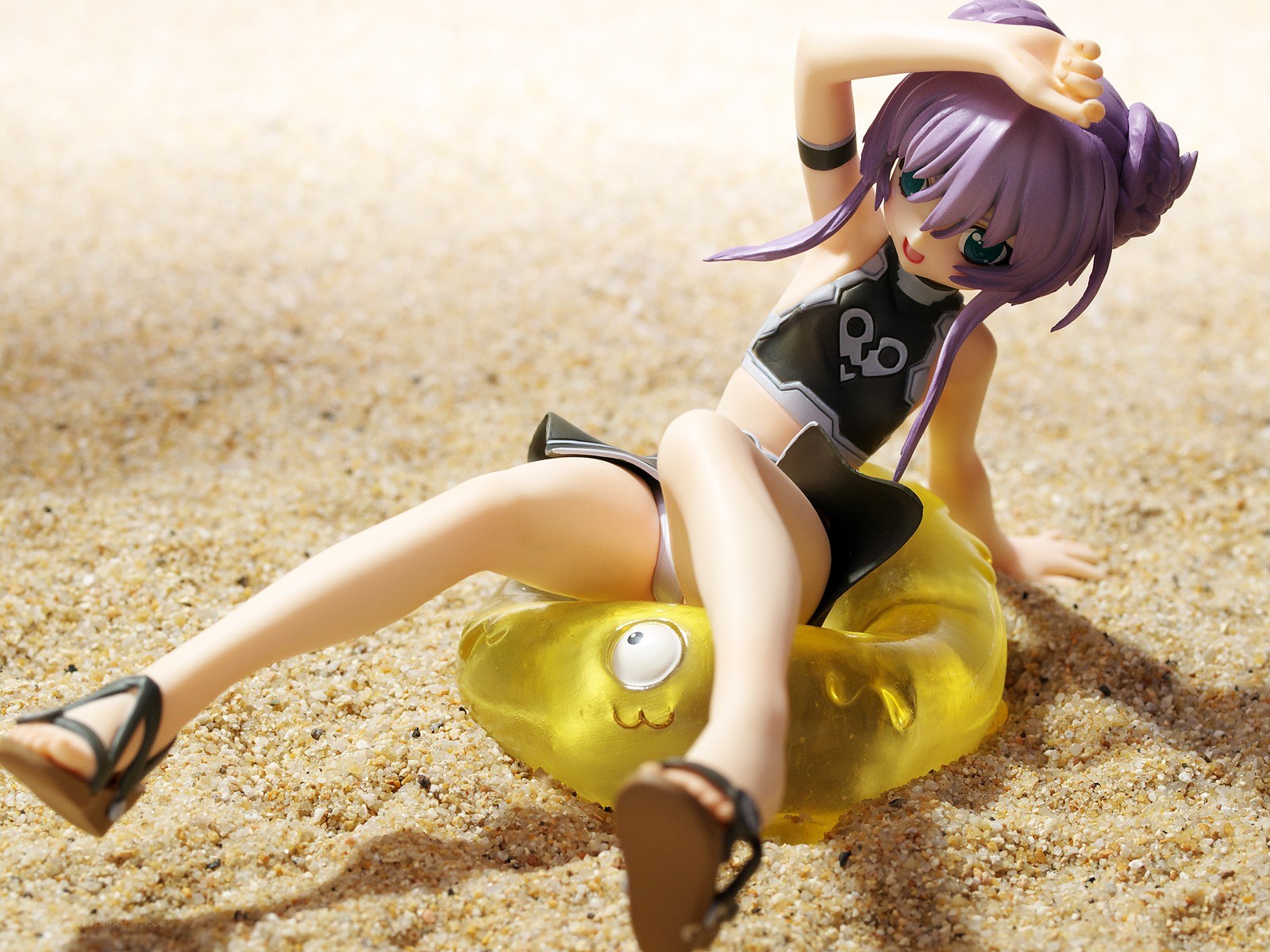 anime figure on beach float