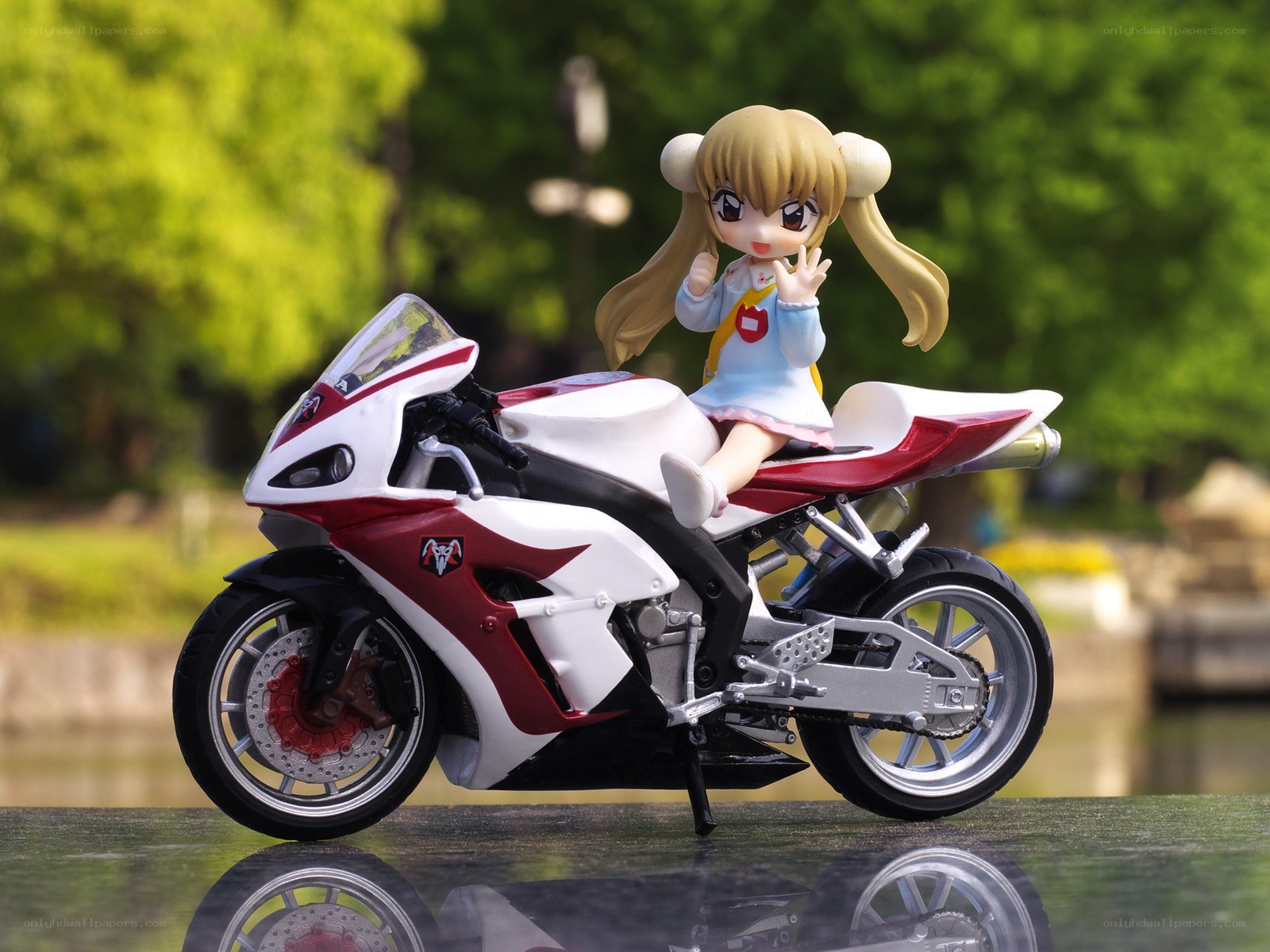 Anime figure on motorcycle